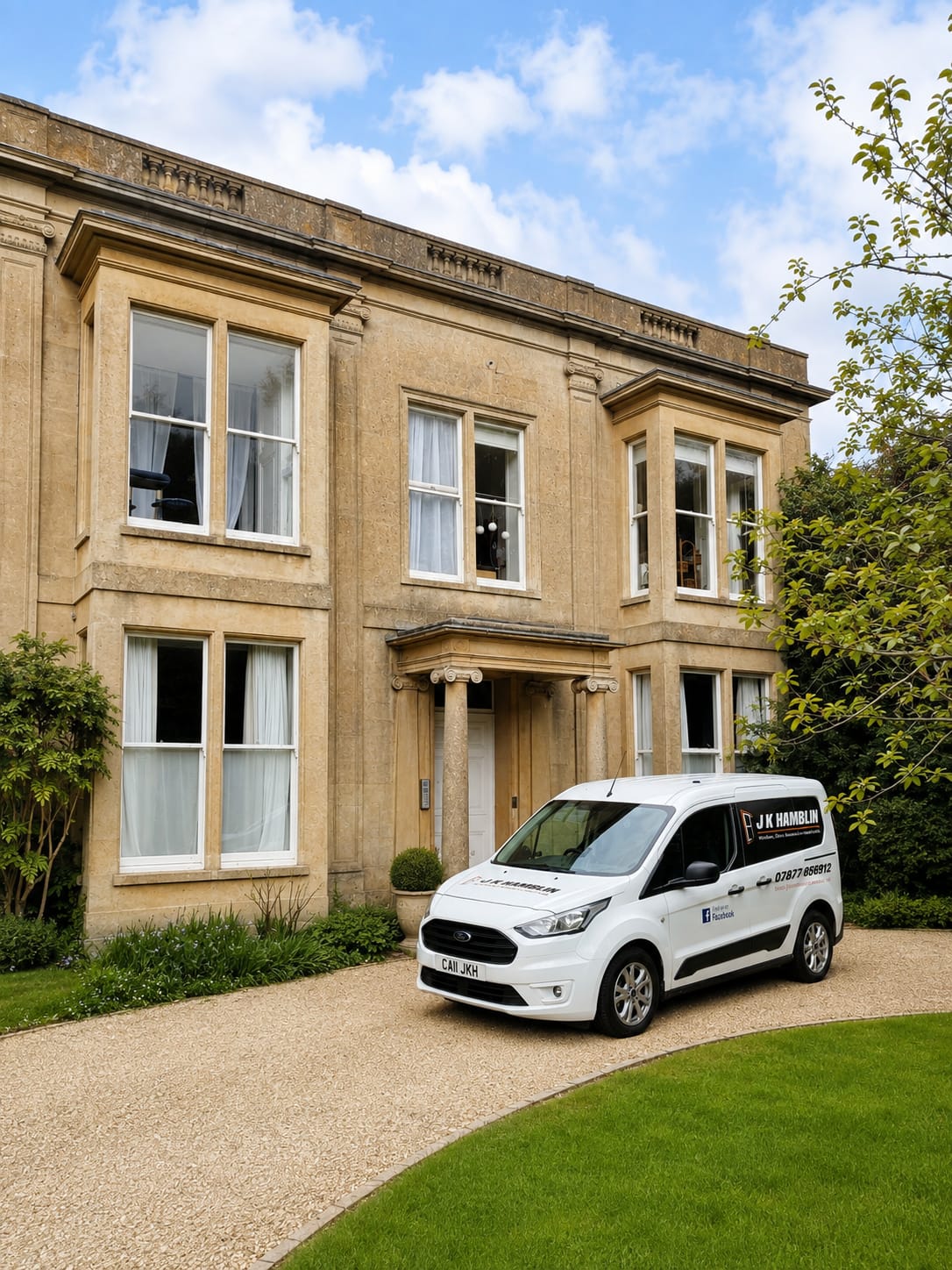 J K Hamblin van outside a period Bath stone house with heritage sash windows