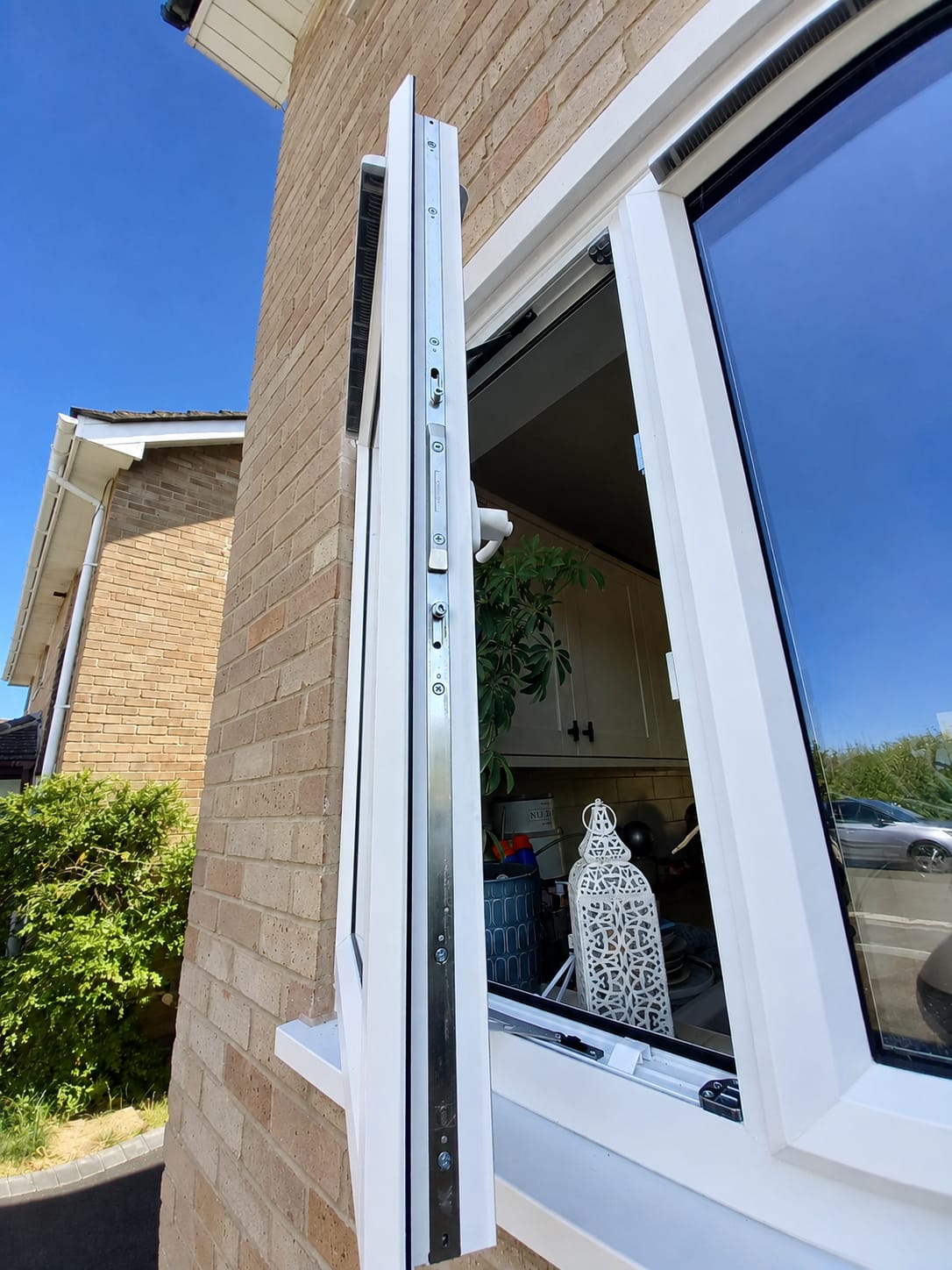 Replacement multipoint locking mechanism fitted to an opening UPVC casement window