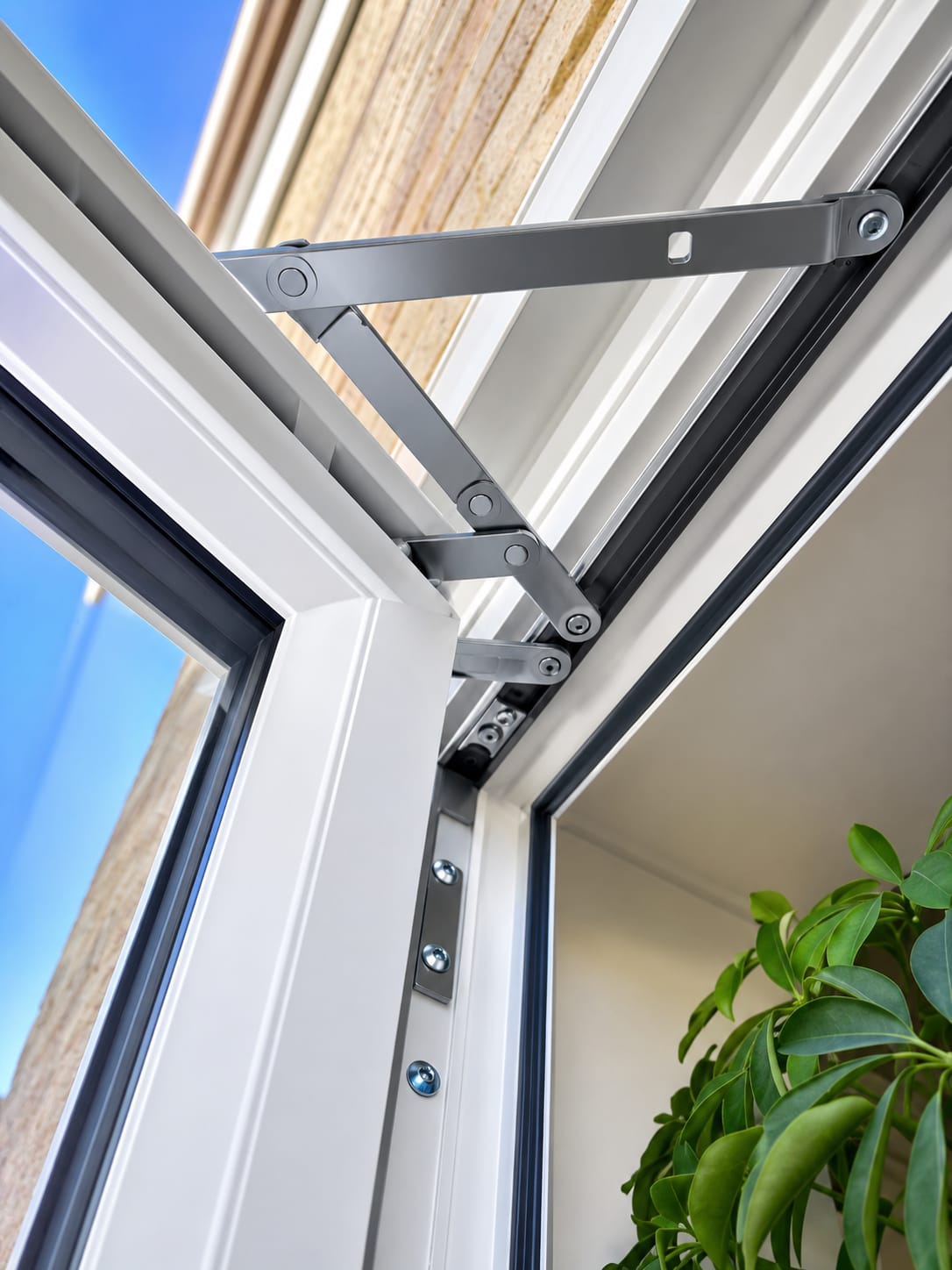 New friction stay window hinge fitted during a window repair